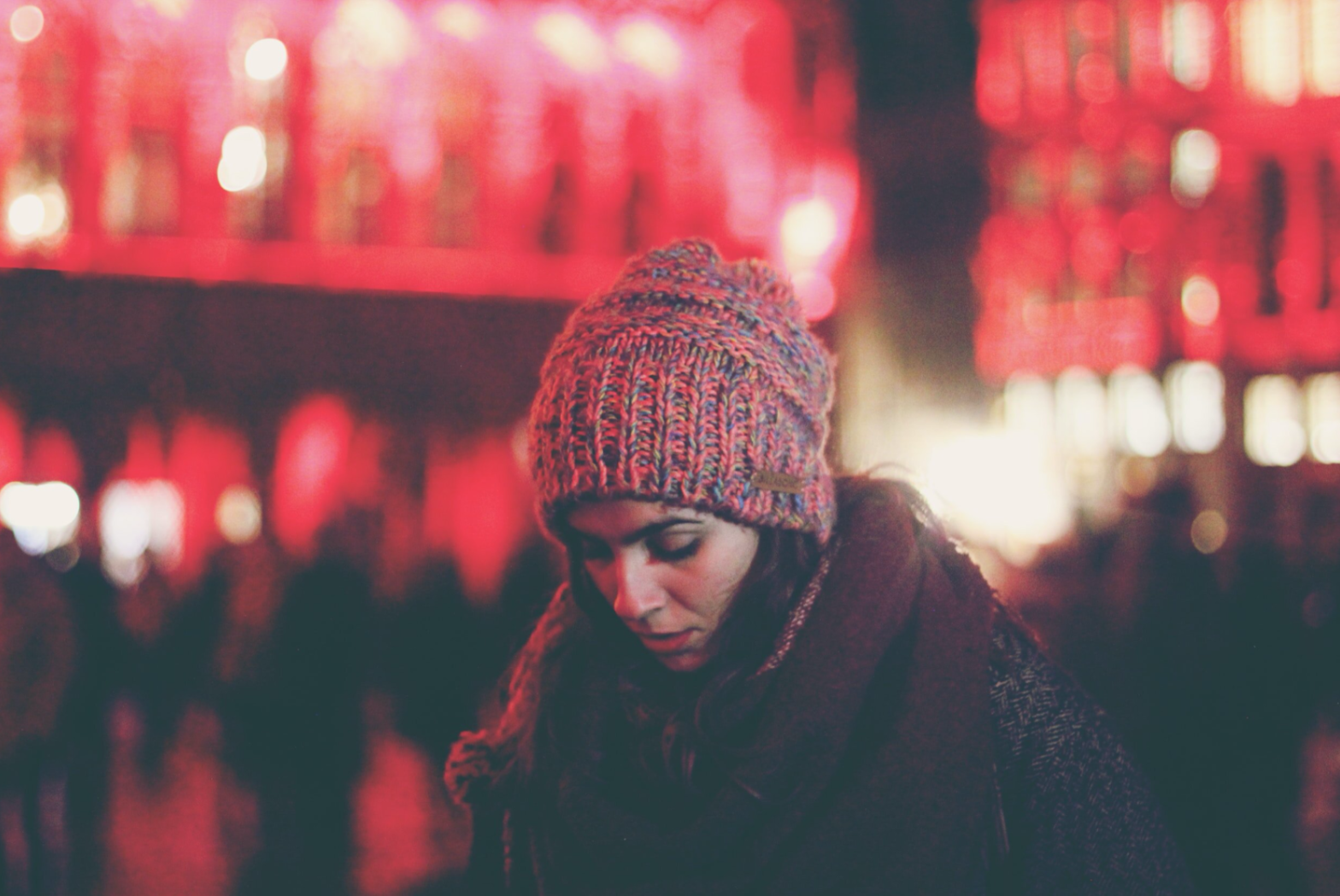 woman with winter hat, looking down